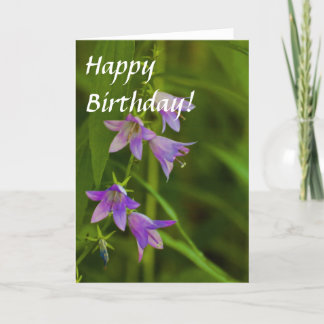 Tarjeta La púrpura toca la trompeta los wildflowers