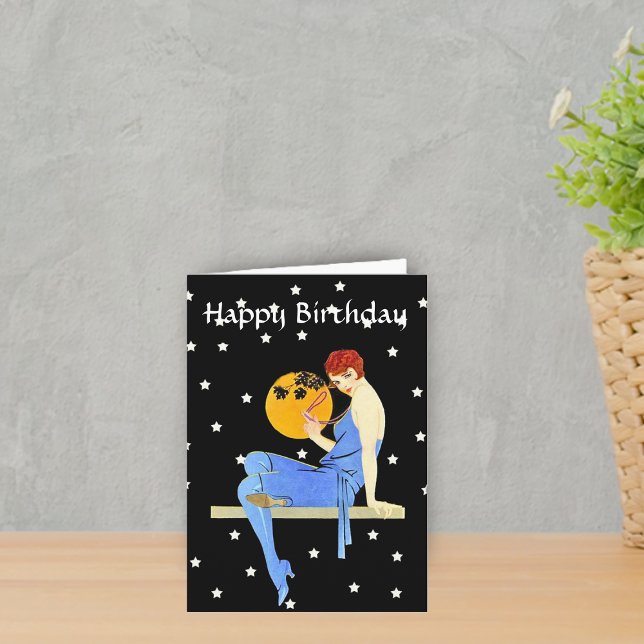 Tarjeta La virgen dama de los años 1920 y las estrellas de (Flapper from 1920's red hair blue dress pearls on shelf moon stars on black Happy Birthday card.)