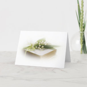 Tarjeta lirio del valle con biblia