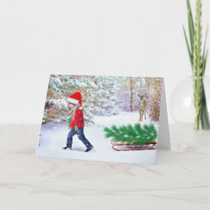 Tarjeta Llevando a casa el árbol de Navidad con saludo int