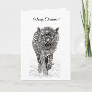 Tarjeta Lobo negro enojado en la nieve, invierno salvaje