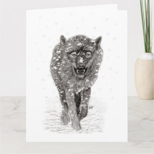 Tarjeta Lobo negro enojado en la nieve, invierno salvaje