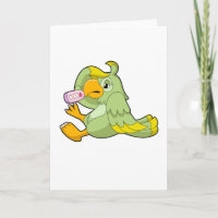 Loro con termómetro clínico