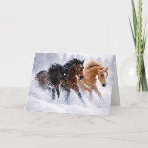 Tarjeta Manada de caballos salvajes en la nieve de Navidad