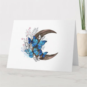 Tarjeta Mariposas azules sobre la media luna de madera