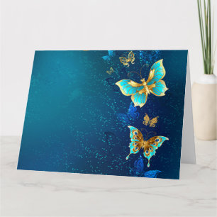 Tarjeta Mariposas doradas sobre fondo azul