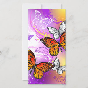 Tarjeta Mariposas monarcas en fondo morado