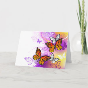 Tarjeta Mariposas monarcas en fondo morado