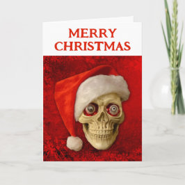 Tarjeta Merry Christmas. Skull wearing Santa hat