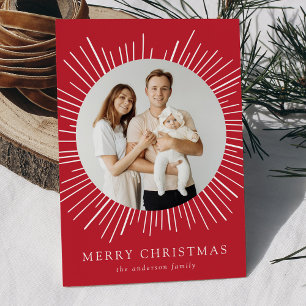 Tarjeta moderna de Navidad con sol rojo explosión
