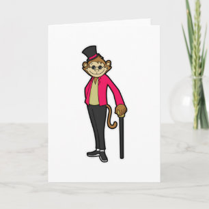 Tarjeta Mono como Caballero con Gorra y palo para caminar