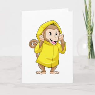 Tarjeta Mono con lluvia y impermeable