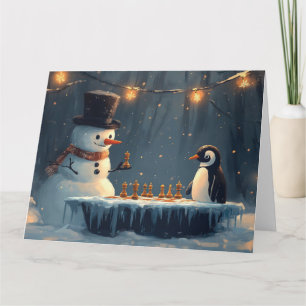 Tarjeta Muñeco de nieve adorable y pingüino jugando ajedre