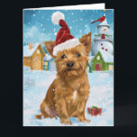 Tarjeta Navidades australianos del Terrible Winter Wonderl<br><div class="desc">su diseño festivo capta el alegre espíritu de la temporada navideña, con un adorable cachorro vestido con un sombrero de Santa. El gato está enclavado en un maravilloso promontorio invernal, con un muñeco de nieve, un árbol de Navidad decorado y regalos hermosamente envueltos. Los copos de nieve caen suavemente, añadiendo...</div>