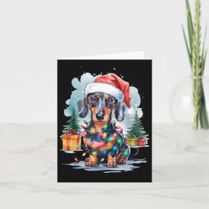 Tarjeta Navidades Dachshund Dog Santa Hat iluminan el vien