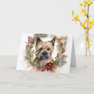 Tarjeta Navidades de Cairn Terrier en una presentación fes