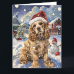 Tarjeta Navidades de Cocker Spaniel Winter Wonderland<br><div class="desc">Este diseño festivo capta el alegre espíritu de la temporada navideña, con un adorable cachorro vestido con un sombrero de Santa. El perro está enclavado en un maravilloso país invernal, con un muñeco de nieve, un árbol de Navidad decorado y regalos hermosamente envueltos. Los copos de nieve caen suavemente, añadiendo...</div>
