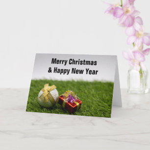 Tarjeta Navidades de golf con regalos de golf de cinta dor