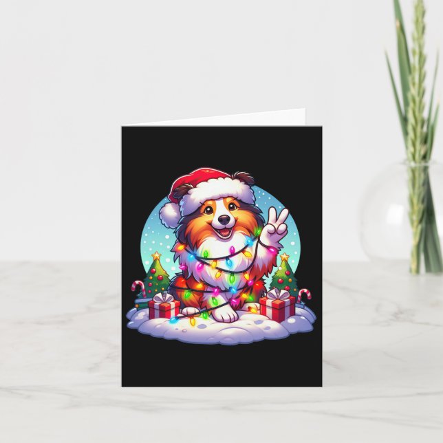 Tarjeta Navidades de Peace Hand Shetland Sheepdog iluminan (Anverso)