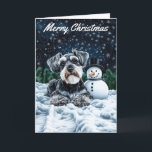 Tarjeta Navidades de Schnauzer y Snowman<br><div class="desc">Envíe saludos festivos con esta encantadora tarjeta de Navidades en Miniatura Schnauzer que incluye un adorable Schnauzer y un animado muñeco de nieve. El Schnauzer se asienta en un hermoso paisaje invernal bajo un cielo estrellado, con delicados copos de nieve cayendo por ahí. Al lado del Schnauzer se encuentra un...</div>