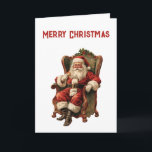 Tarjeta Navidades del Retro Santa Claus sentados en la pre<br><div class="desc">Tarjeta de navidad con una imagen de estilo vintage con el clásico Santa Claus sentado en un sillón de estilo antiguo. Bonito diseño de Navidades tradicionales.</div>