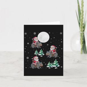 Tarjeta Navidades divertidos de Xmas Tree Santa Riding Wom