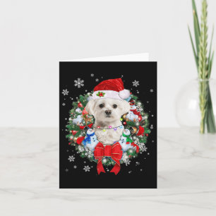 Tarjeta Navidades malteses con decoración navideña pijamas