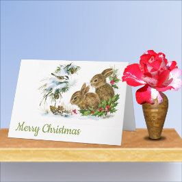 Tarjeta Navidades nevan conejitos y pájaros