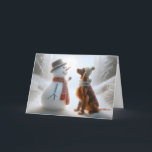 Tarjeta Navidades Snowman con un perro guardián irlandés<br><div class="desc">Un muñeco de nieve y un perro Setter irlandés,  ambos con bufandas,  comparten un momento de compañía en un entorno de bosques nevados</div>