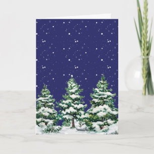 Tarjeta Nieve cubierta de árboles verdes con nieve cayendo