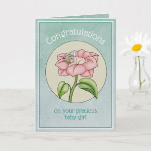 Tarjeta Niña lactante duerme en la flor