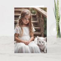Niña pequeña con gato blanco por cumpleaños