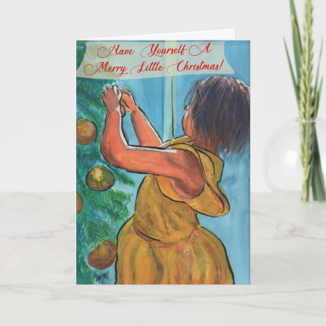 Tarjeta Niña pequeña decorando el árbol de Navidad (Anverso)