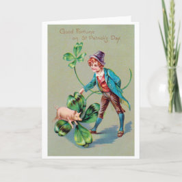 Tarjeta Niño del Día de San Patricio y cerdo afortunado, c