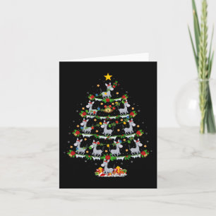 Tarjeta Nochebuena de Navidad iluminando el árbol de navid