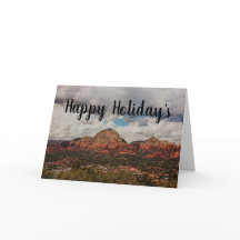 Nubes mientras se meten en Sedona Felices Fiestas