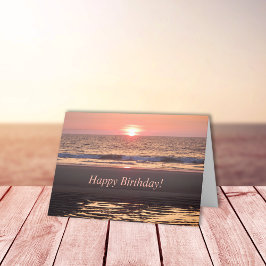 Tarjeta Nuevo sol en el océano