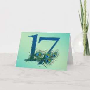 Tarjeta números de pavo real del 17 cumpleaños o aniversar