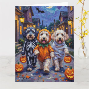 Tarjeta Old English Sheepdogs haciendo 'trick-or-treat' en