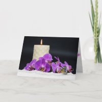 orquídeas rosadas y vela con simpatía por mariposa