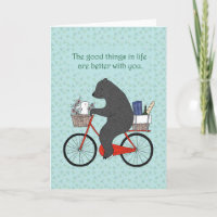 Oso y conejo en bicicleta yendo a hacer picnic amo