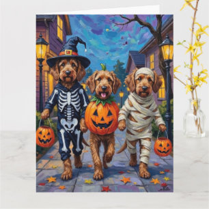 Tarjeta Otterhound pidiendo dulces con disfraces de Hallow