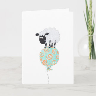 Tarjeta ovejas mullidas en swirly el globo