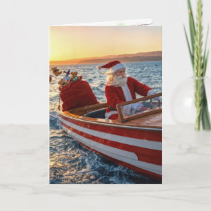 Tarjeta Papá Noel conduciendo una lancha rápida