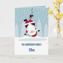 Tarjeta Papá Noel divertido colgado boca abajo