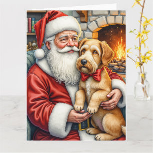 Tarjeta Papá Noel sosteniendo arte navideño de Airedale