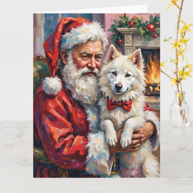 Tarjeta Papá Noel sosteniendo arte navideño de Samoyed (flor amarilla)