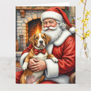 Tarjeta Papá Noel sosteniendo un terrier americano staffor