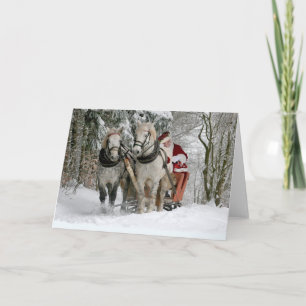 Tarjeta Papá Noel viaja en un trineo tirado por caballos
