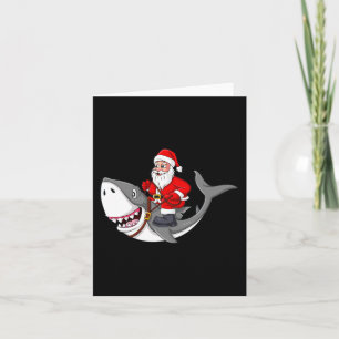 Tarjeta Papá Noel viajando en Navidades de tiburones niños